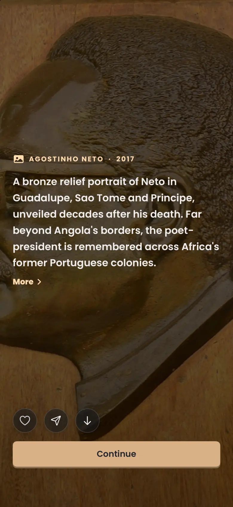 Image chapter reveal over a bronze relief portrait: a picture icon beside AGOSTINHO NETO and 2017, a caption describing a bronze relief portrait of Neto in Guadalupe, Sao Tome and Principe, a More link, heart, share and download buttons, and a Continue button.
