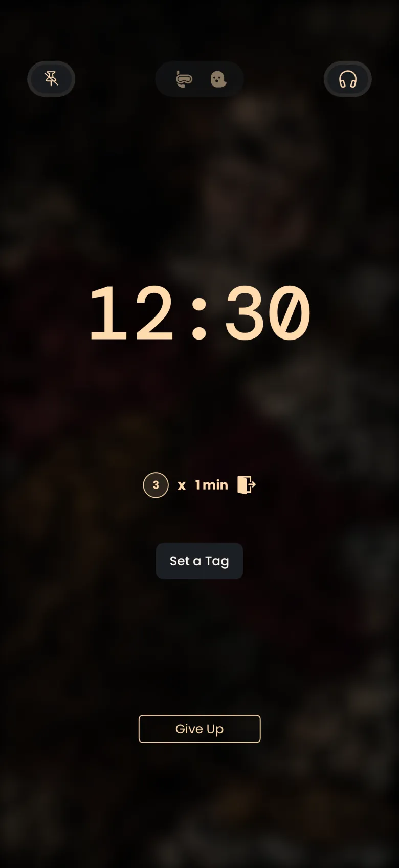A countdown reading 12:30 over a heavily blurred, darkened dot picture, with pin, mode and headphones buttons at the top, an exits badge reading 3 x 1 min, a Set a Tag button and an outlined end-session button.